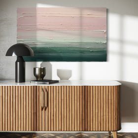 A light Coral, light pink, celadon and hunter green thickly textured abstract painting by Teodora Guererra hanging on a white wall over a mid-century modern credenza.