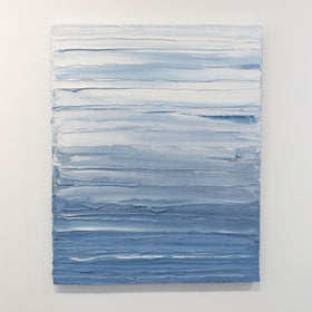 A painting is hanging on a wall. Its surface is decorated with blue and white paint in thick impasto streaks. Wired and ready to hang.