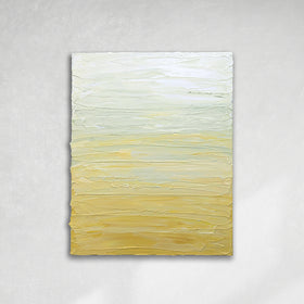 A Yellow, seafoam green and white textured painting by Teo Guererra hangs on a wall