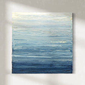 A blue, beige, lavender and light yellow textured abstract painting by Teodora Guererra hangs on a white wall.