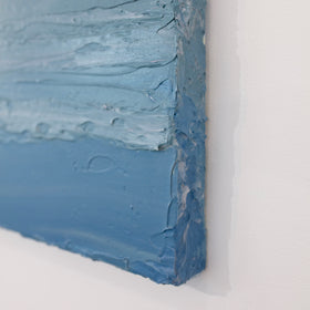 A close up view of the texture of the paint and sides of this Teodora Guererra painting.