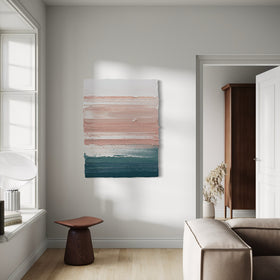 Modern living room with abstract painting on the wall, neutral decor, and a side table.