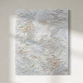 A thick textured impasto abstract painting with large brush strokes hanging on the artists studio wall.