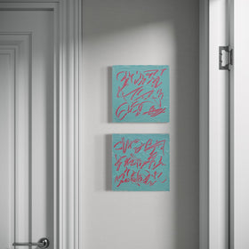 Two square texted based abstract paintings with textured teal backgrounds and pink abstract graffiti-style lettering,  hanging vertically on a gray wall in a doorway.