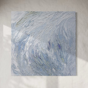 A Grey blue, light blue, lavender, celadon and white thickly textured abstract painting hanging on a white wall in natural light by Teodora Guererra.