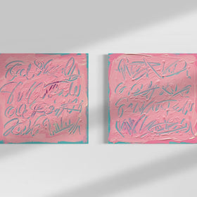 Two square pink text based paintings with writing into the surface with various tools, carving fluid script that reveals the teal color hidden below. Displayed side-by-side on a white wall with soft diagonal shadows.