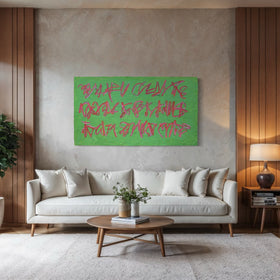 A modern living room featuring a light beige sofa, a round wooden coffee table, a large potted plant, and an original textured green painting with red graffiti-style lettering mounted on the wall above the sofa.