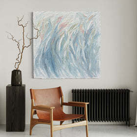 Modern interior with a brown leather chair, featuring an original abstract painting by Teodora Guererra, and decorative vase.