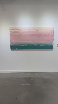 A video of a peach, orange, coral, pale pink and teal thickly textured abstract painting hangs on a white wall.