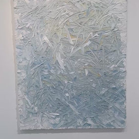 A video of an original abstract textured painting by Teodora Guererra with blue and white tones hanging on a white wall.