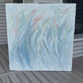 A video of an original abstract painting by Teo Guererra on a wooden deck at her studio.