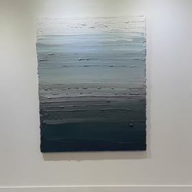 A video of a dark grey blue, light blue, blue green, and white thickly textured abstract painting hanging on a white wall in natural light by Teodora Guererra.