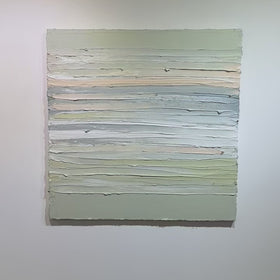 A video of celadon, grey, white, peach and sage green thickly textured painting hanging on a white wall by Teodora Guererra.