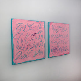 Two square pink text based paintings with writing into the surface with various tools, carving fluid script that reveals the teal color hidden below. Displayed side-by-side, side view, on a white wall with soft diagonal shadows.