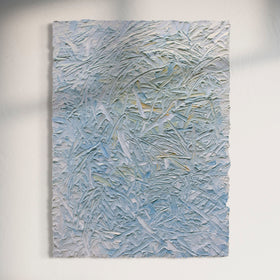 Textured original abstract painting by Teo Guererra hanging on a white wall.