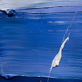 A close up detail shot of a blue and white textured abstract painting by Teodora Guererra.