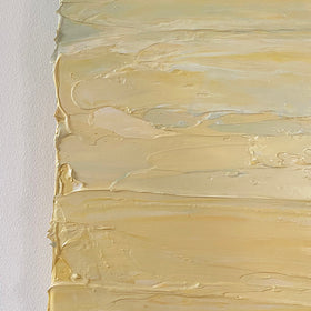 A close up of the texture of the yellow, seafoam green and white textured painting by Teo Guererra.