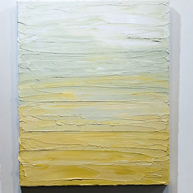 A Yellow, seafoam green and white textured painting by Teo Guererra hangs on a wall