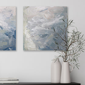 A painting is hanging on a wall over a dark brown mid century modern table with 2 white vases and plant. Its surface is decorated with white, blue and green paint in a thick impasto. Wired and ready to hang.
